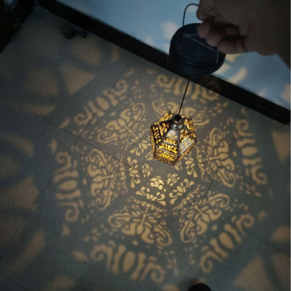 Solar iron hollow projection lamp